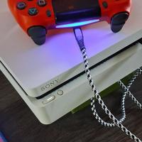  PS4 Slim Wit 500GB + 4x F1 (2017-2020) + 2 Rode Controllers