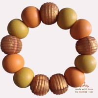 Noekies Handgemaakte Bijtring mosterdgeel goud - Nieuw!