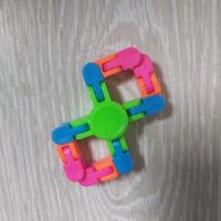 Flexibele Fidget Spinner groen meerkleurig