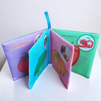 Educatief stoffen knisper babyboekje vegetable
