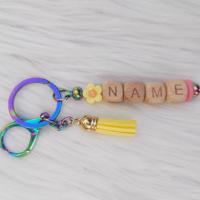 Sleutelhanger-tashanger geel gepersonaliseerd met naam