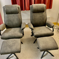 Twee als nieuwe Leren Draai Fauteuils 