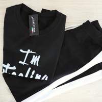 Set joggingbroek + sportshirt, 1 maat (34/40) zwart (nieuw) 