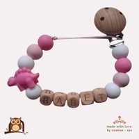 nr 13 noekies naam speenkoord dino stekel roze wit