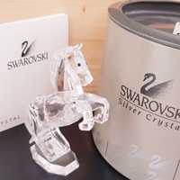 Swarovski hengst + doos + certificaat oortjes gerepareerd