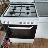 Gasfornuis met elektrische oven. Knoppen kunnen af en toe los springen en bovenwarmte oven is stuk.