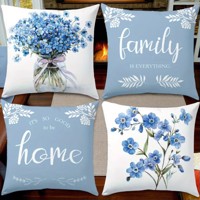 Set van 4 kussenhoezen lichtblauwe flowers met tekst 45x45cm