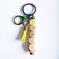 Sleutelhanger-tashanger geel gepersonaliseerd met naam