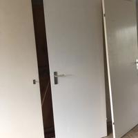 Drie Opdekdeuren met sloten en klinken