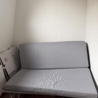 Slaapbank met wasbare hoes, gaat weg in verband met verhuizing