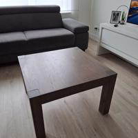 Eettafel met 4 stoelen en bijbehorende salontafel