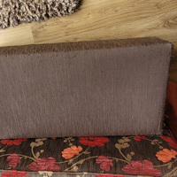 Poef en bankstel en fauteuil