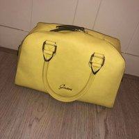 Gele Guess hand tas in goede conditie. 