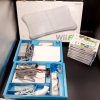 Nintendo Wii console + 2 controllers + 1 nunchuk + 11 games 