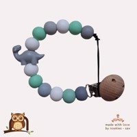 nr 16 noekies Speenkoord Dino langnek mintgroen grijs