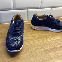 Blauwe lage schoen