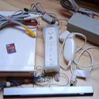 Nintendo Wii + 1 controller + 1 nunchuk