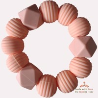 Noekies Handgemaakte Bijtring pasteloranje - Nieuw!