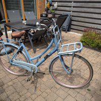Sparta damesfiets met bagagedrager voorop