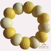 Noekies Handgemaakte Bijtring geel - Nieuw!