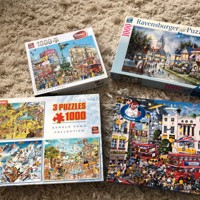 4 stuks als nieuw compleet puzzels in doos