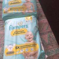 2 nieuwe verpakte  pakken pampers