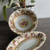 Vintage porseleinen bord en schaal