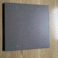 15 doosjes grijze 15 x 15 vloertegels
