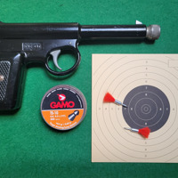Vintage "The Gat" luchtpistool. 