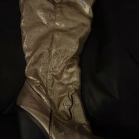 Hoge laarzen  in de kleur goud 