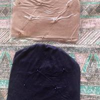 twee nieuwe leuke tricot rekbaar mutsen