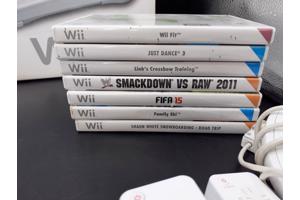 Nintendo Wii + 4 controllers + 2 nunchuks + 1 Wii geweer + 7