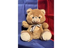 Beer met strik en rits voetzolen bruin beige