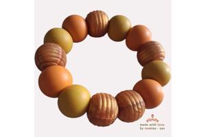 Noekies Handgemaakte Bijtring mosterdgeel goud - Nieuw!