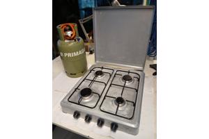 Gasfornuis en propaangasfles voor tijdelijk keukenwerk