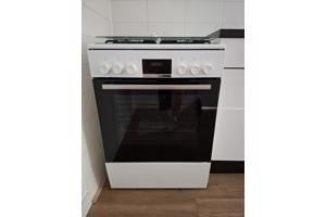 Verplaatsbaar gasfornuis met elektrische oven in goede staat