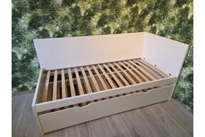 2 eenpersoonsbedden, uitschuifbaar