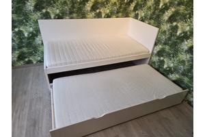 2 eenpersoonsbedden, uitschuifbaar