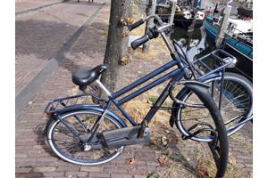Kinderfiets, merk Sparta, veel gebruikt, maar nog goed voor in de stad.