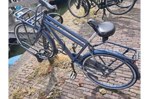 Kinderfiets, merk Sparta, veel gebruikt, maar nog goed voor in de stad.