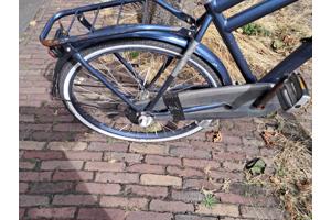 Kinderfiets, merk Sparta, veel gebruikt, maar nog goed voor in de stad.