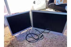twee computer monitoren incl. standaard en kabel