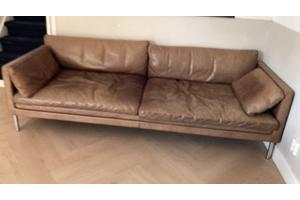 Bruine leren trendy bank