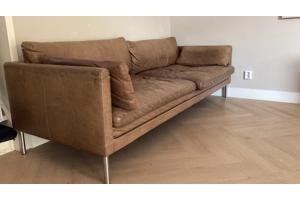 Bruine leren trendy bank