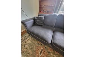 Prima onderhouden ruime blauwe  hoekbank