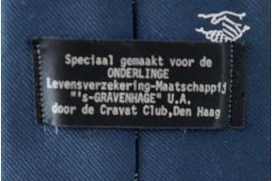 Stropdas van Onderlinge ‘s-Gravenhage donkerblauw.