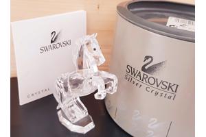 Swarovski hengst doos en certificaat oortjes gerepareerd