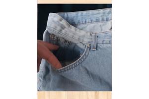 wijde jeans driekwart lang met omslagpijp lichtblauw 32 M/L