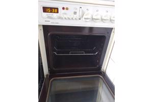 Smal 4 pits gasfornuis met hetelucht oven