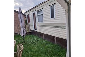 Te koop stacaravan 11 x 3,70 meter